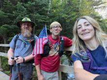 Us on the bridge at Marcy Dam