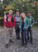 Us at the start of the trek plus 1.